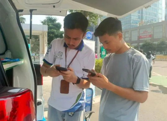 Layanan BPJS Keliling di Jalan Sudirman, Karet Tengsin, Kecamatan Tanah Abang, Jakarta Pusat, Minggu, 19 Oktober 2025. (Sumber: Dok. BPJS)