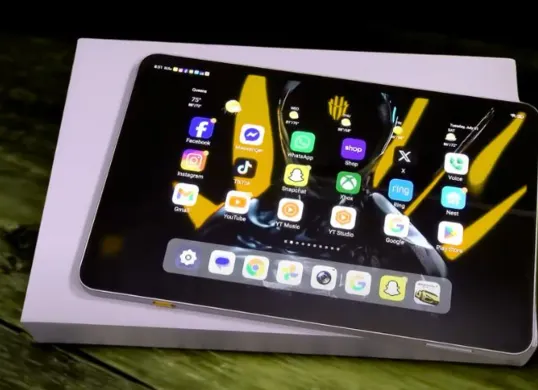 Ilustrasi tablet gaming Red Magic dengan desain futuristik dan sistem pendingin aktif untuk menjaga performa tetap stabil saat bermain game berat. (Sumber: Pinterest)