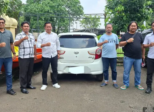 Barang bukti mobil kasus penggelapan disita Polsek Tajurhalang di Kabupaten Bogor. (Sumber: Poskota/Angga Pahlevi)