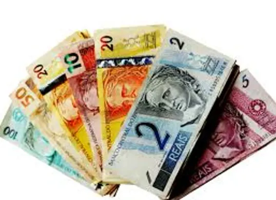 Ilustrasi berbagai mata uang dunia, dengan Dinar Kuwait menjadi yang terkuat pada 2026 berdasarkan nilai tukar terhadap dolar AS. (Sumber: Istimewa)