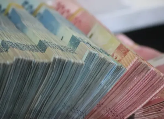 Ilustrasi - Perkiraan tanggal pencairan THR PNS 2026. (Sumber: Unsplash/Mufid Majnun)