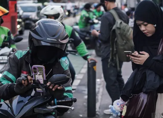 Menaker pastikan ojol dapat pencairan THR 2026. (Sumber: Poskota/Bilal Nugraha Ginanjar)