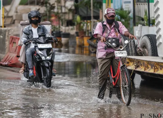 Ilustrasi. Sejumlah RT dan ruas jalan di Jakarta tergenang banjir. (Sumber: Poskota/Bilal Nugraha Ginanjar)