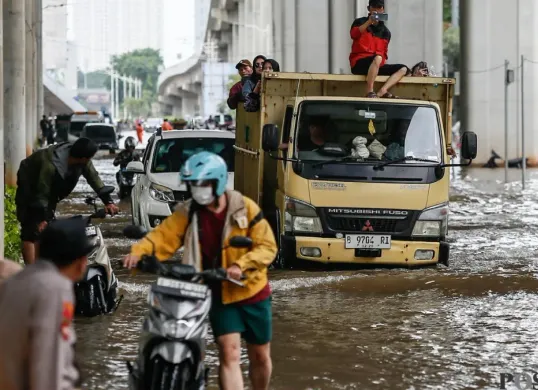 Ilustrasi banjir Jakarta. (Sumber: Poskota/Bilal Nugraha)