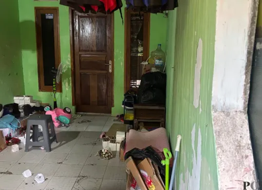 Lokasi pembunuhan sadis yang dilakukan suami kepada istrinya di wilayah Kecamatan Sukaraja, Kabupaten Bogor. (Sumber: Poskota/Giffar Rivana)