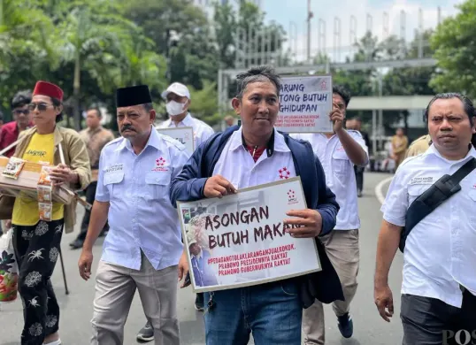 Asosiasi pedagang kaki lima bereaksi terhadap dugaan intervensi asing dalam kebijakan Kawasan Tanpa Rokok. (Sumber: Poskota/Pandi Ramedhan)