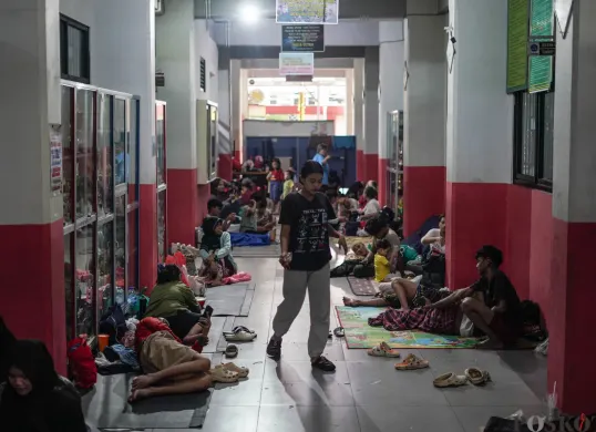 Ilustrasi pengungsi korban banjir di Jakarta. (Sumber: Poskota/Bilal Nugraha Ginanjar)