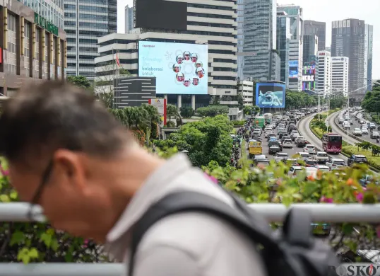 Ilustrasi pekerja di Jakarta. (Sumber: Poskota/Bilal Nugraha Ginanjar)