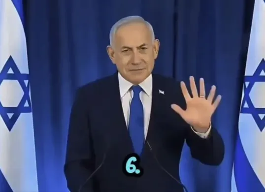 Rumor Benjamin Netanyahu meninggal dunia viral di media sosial setelah video konferensi pers menunjukkan 6 jari di tangannya. (Sumber: X/@kafiradikalis)