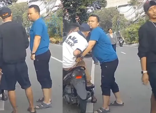 Pengendara mobil (kaos biru) menjadi korban dugaan pemalakan sekelompok orang dengan modus pengawalan di kawasan Tanah Abang, Jakarta Pusat, Jumat, 27 Maret 2026. (Sumber: Tangkapan Layar)