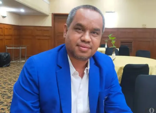 Pengamat politik dan ekonomi Heru Subagia. (Sumber: Poskota/Gatot Poedji Utomo)