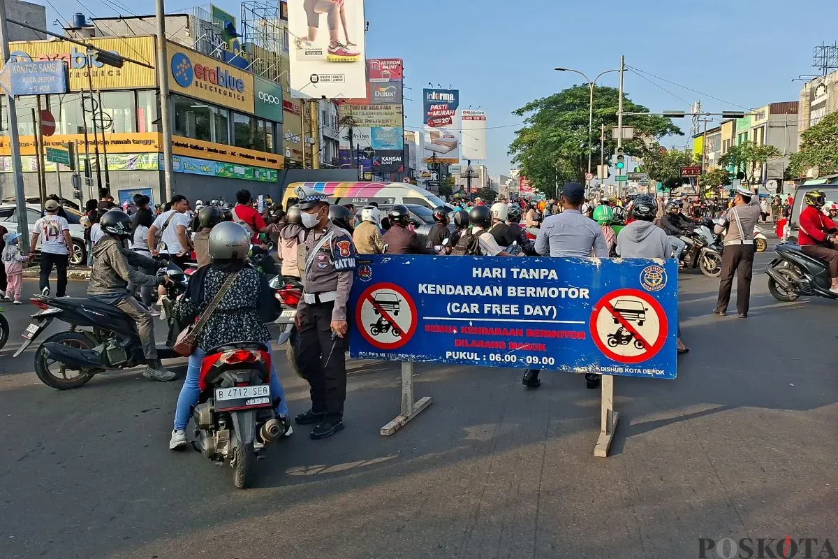 Suasana Car Free Day (CFD) di Jalan Margonda, Kota Depok. (Sumber: Poskota/Angga Pahlevi)