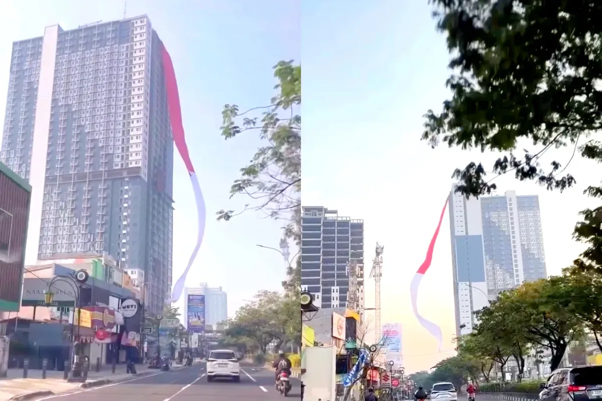 Potret bendera Merah Putih raksasa yang berkibar di gedung tinggi yang berada di wilayah Depok. (Sumber: Instagram/@depok24jam)