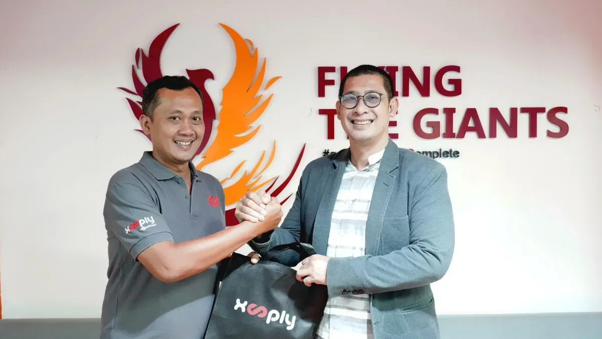 Vice President Xooply Doddi Herlambang (kiri) dan Direktur Bisnis Metranet Faisal Yusuf (kanan).