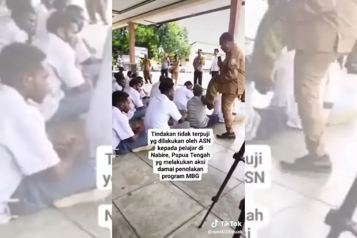 Video viral yang menunjukkan seorang ASN di Papua lakukan hal tidak terpuji terhadap siswa yang unjuk rasa menolak makan bergizi gratis (MBG). (Sumber: X/@JhonSitorus_18)