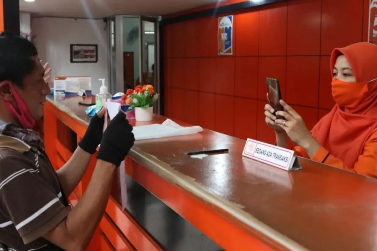 Begini mekanisme pencairan BSU 2025 via kantor pos, simak jadwal pelayanannya. (Sumber: Istimewa)