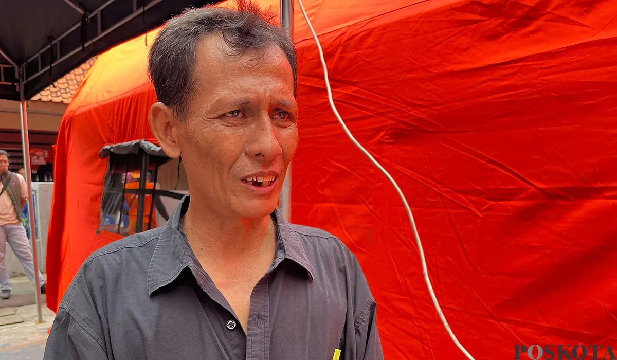 Ketua RT 06 RW 02 Bukit Duri, Fakhri. (Sumber: POSKOTA | Foto: M Tegar Jihad)