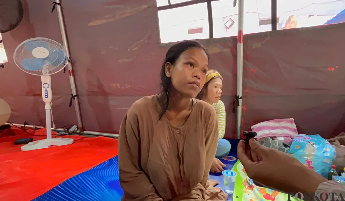 Novi, orang tua dari dua anak korban meninggal dalam peristiwa kebakaran di Bukit Duri, Tebet, Jakarta Selatan. (Sumber: POSKOTA | Foto: M Tegar Jihad)