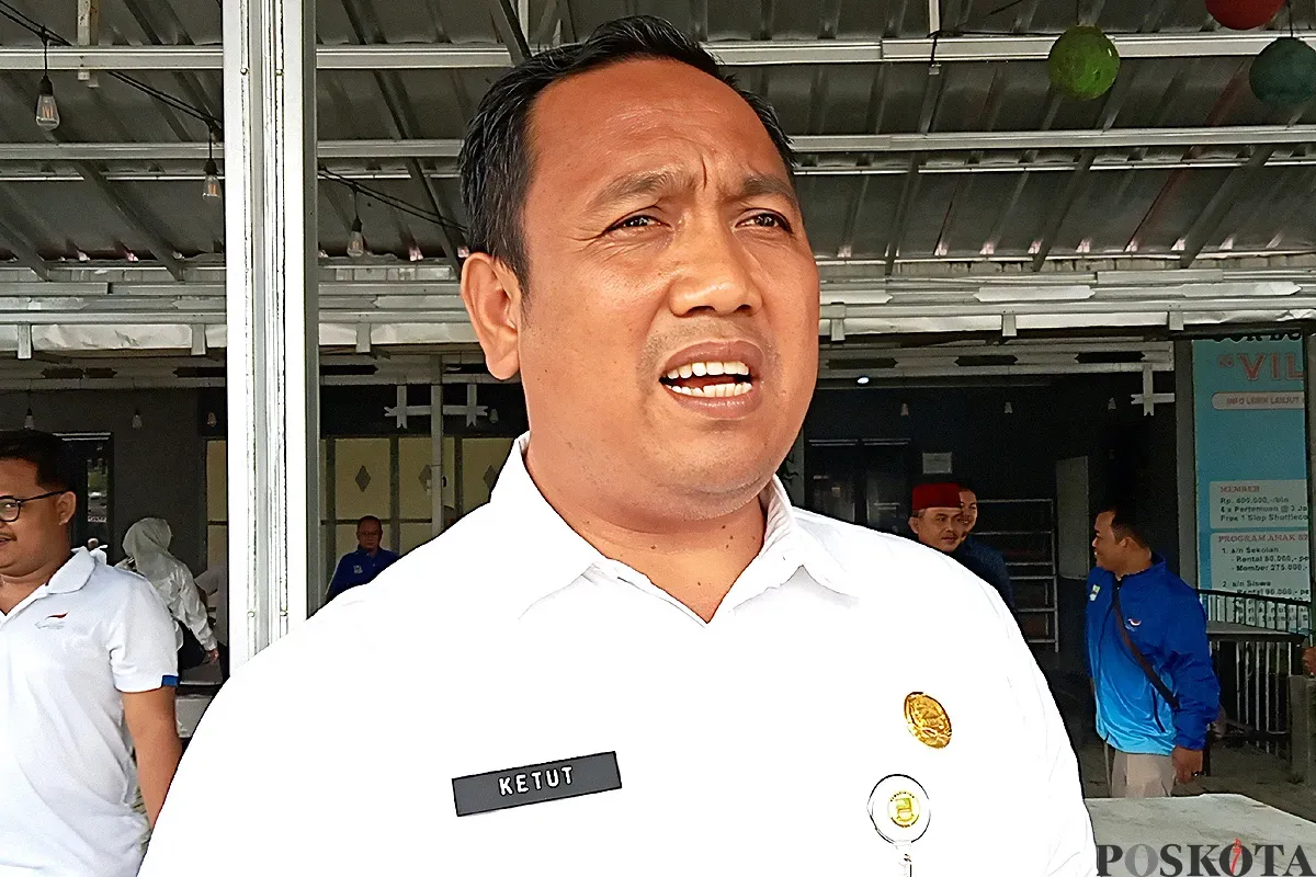 Kabid Peningkatan Prestasi Olahraga Disbudpora Kabupaten Bekasi, Ketut Sudiawan. (Sumber: POSKOTA | Foto: Nurpini Aulia Rapika)