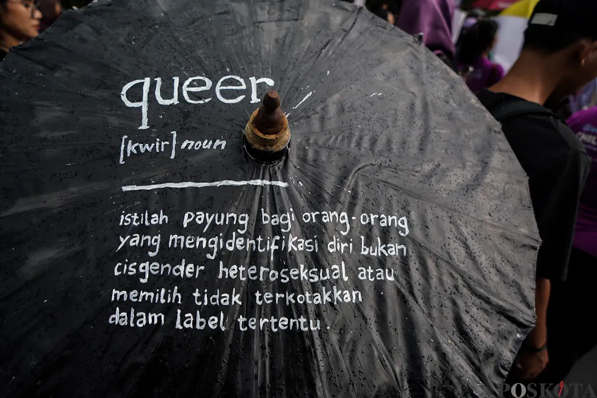 Ratusan perempuan mengikuti aksi damai pada saat memperingati Hari Perempuan Sedunia di Patung Kuda, Jakarta, Sabtu, 8 Maret 2025. (Sumber: Poskota/Bilal Nugraha Ginanjar)