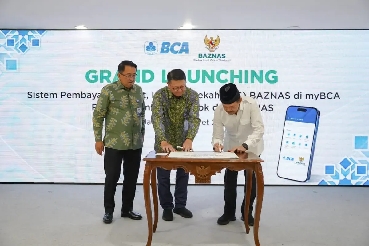 BAZNAS melakukan penandatanganan kerja sama dengan BCA untuk menyediakan layanan zakat, infak, dan sedekah di aplikasi myBCA. (Sumber: Dok. BAZNAS RI)