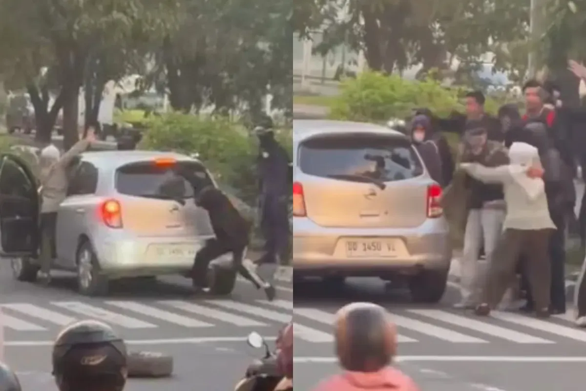 Mobil yang melintas milik ibu-ibu dirusak oleh segerombolan pria berpakaian hitam saat memperingati Hari Buruh atau May Day di Kota Makassar. (Sumber: Tangkap Layar Instagram/@medsoszone)