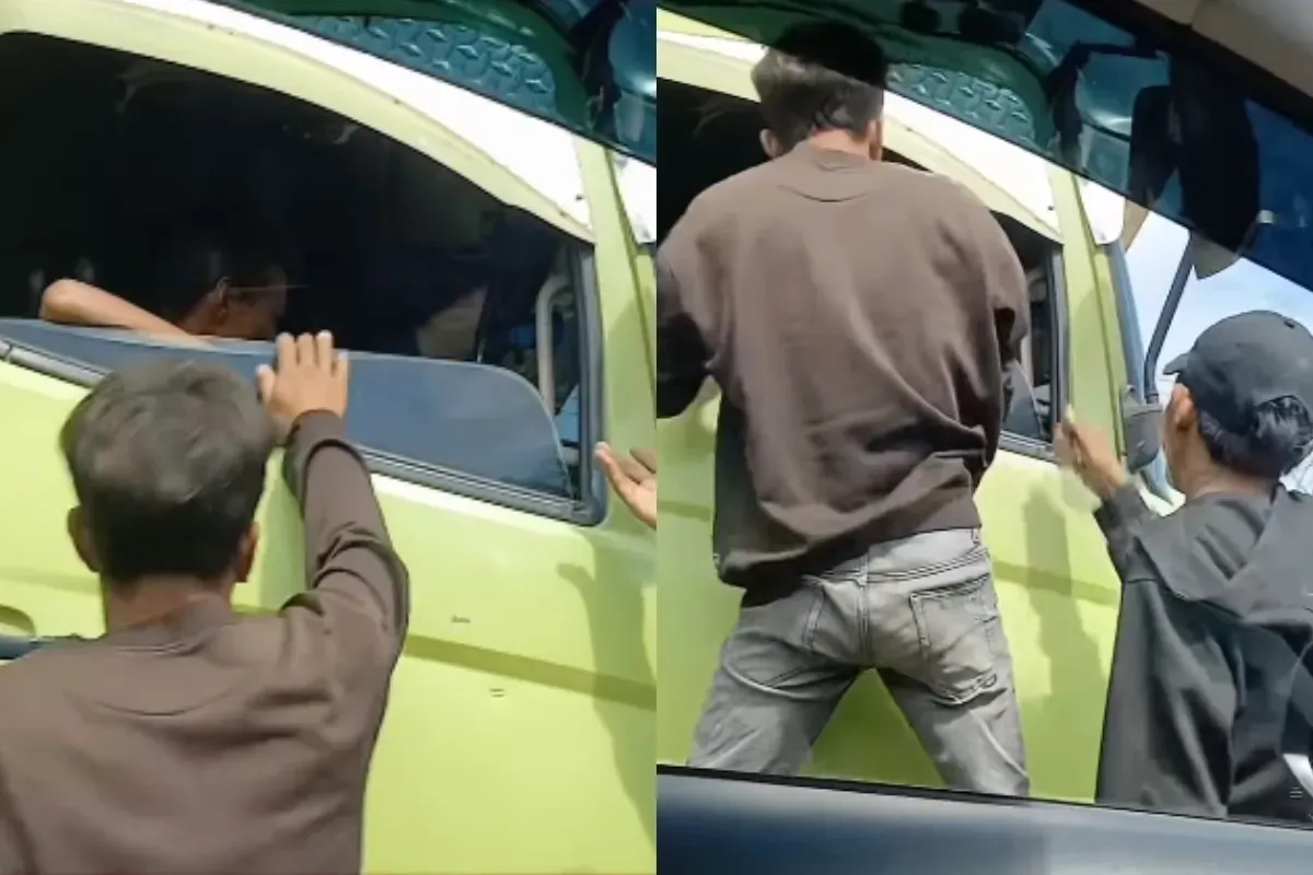 Dua orang preman melakukan pemalakan terhadap seorang sopir truk di Palembang. (Sumber: Tangkap Layar Instagram/@medsoszone)