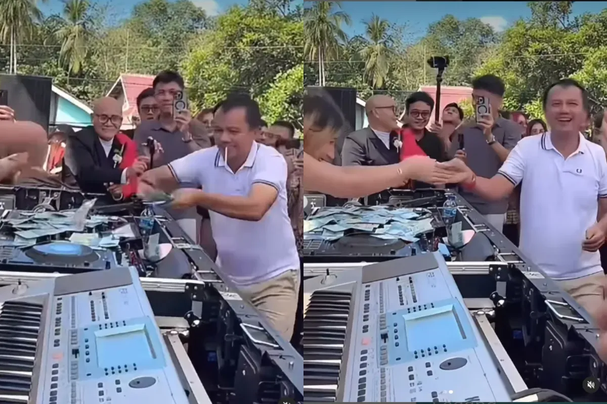 Momen anggota DPRD Lampung Utara, Hatami asyik menyawer DJ wanita. (Sumber: Tangkap Layar Instagram/@fakta.indo)