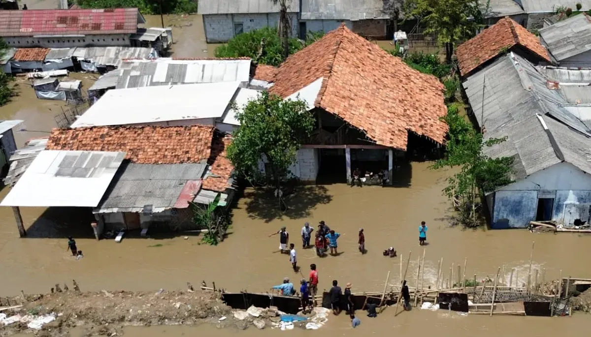 Permukiman warga di Desa Sukamanah, Kecamatan Sukatani, Kabupaten Bekasi, tergenang jebolnya Kali Srengseng Sukatani. (Sumber: Istimewa)