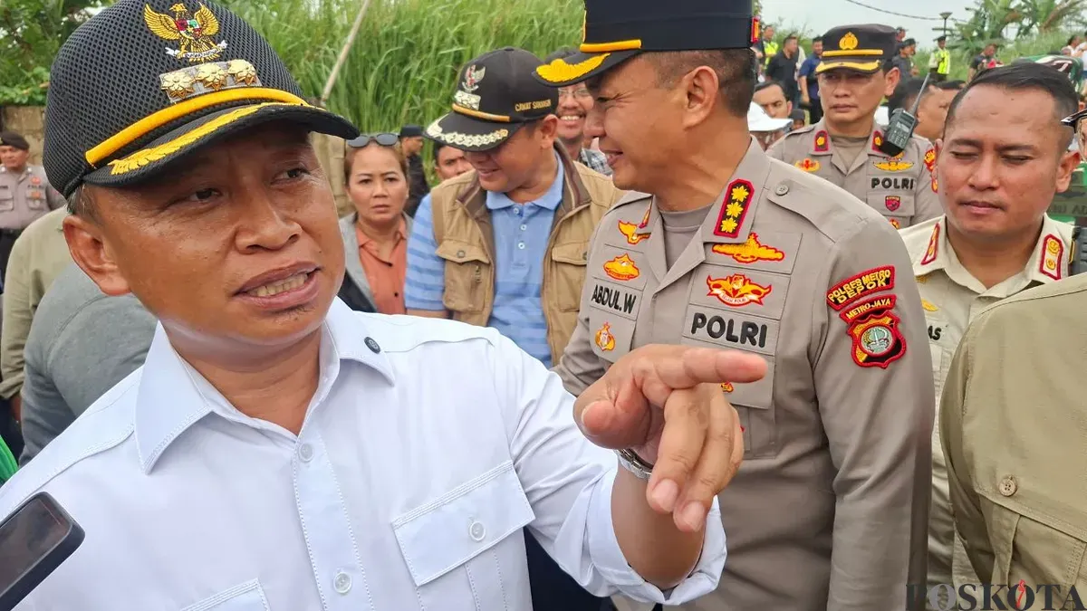 Wali Kota Depok Supian Suri didampingi unsur Forkompimda kepada wartawan. (Sumber: Poskota/Angga Pahlevi)