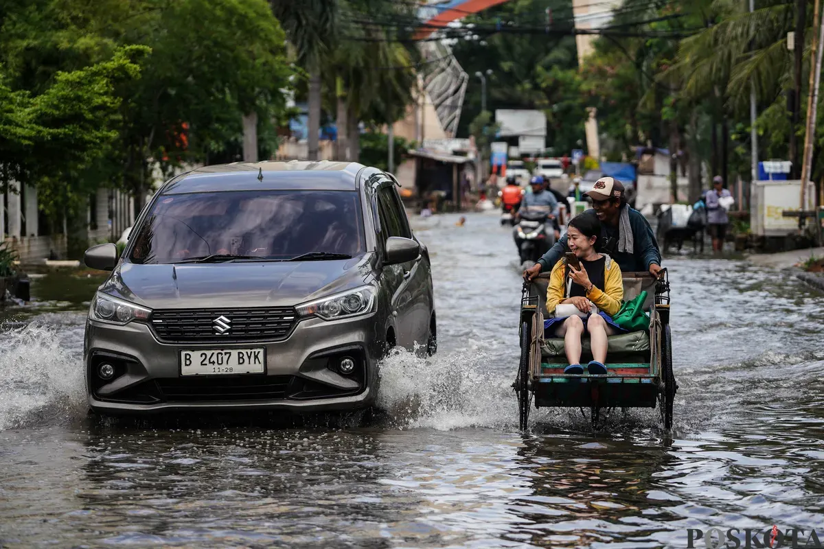 Warga beraktivitas di Muara Baru, Jakarta Utara, Minggu, 1 Februari 2026. (Sumber: Poskota/Bilal Nugraha Ginanjar)