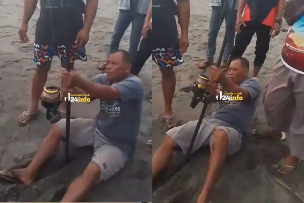 Momen seorang pemancing berupaya menyelamatkan wisatawan yang terseret ombak di Pantai Ketawang. (Sumber: Tangkap Layar Instagram/@jabodetabek24info)