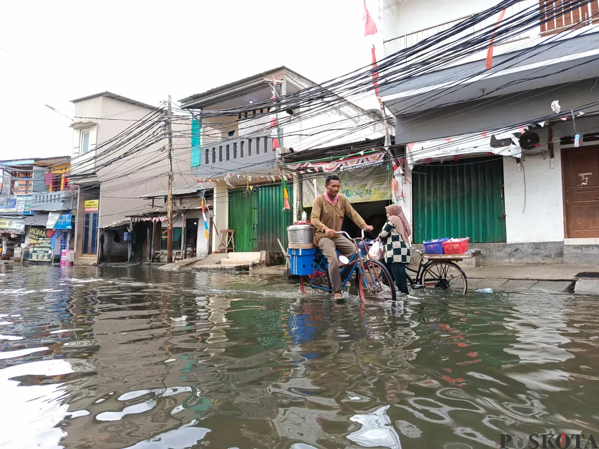 Ilustrasi banjir. (Sumber: Poskota/Ali Mansur)
