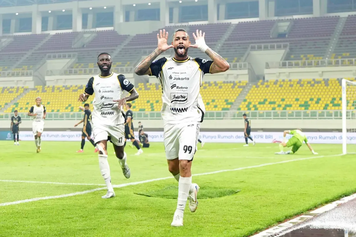 Potret pemain Persija Jakarta, Maxwell Souza saat melakukan selebrasi gol ke gawang Dewa United. (Sumber: Persija)