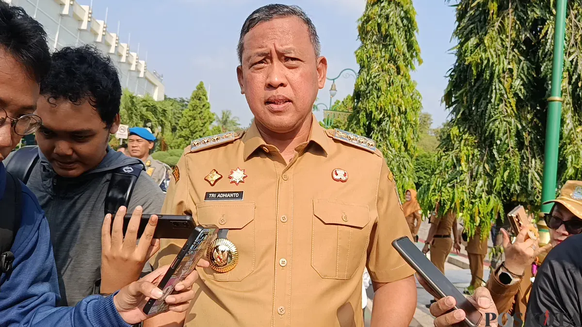 Wali Kota Bekasi, Tri Adhianto, menyebut dirinya tak lagi menggunakan sirine maupun strobo saat menggunakan pengawalan dinas.(Sumber: Poskota/Nurpini Aulia Rapika)