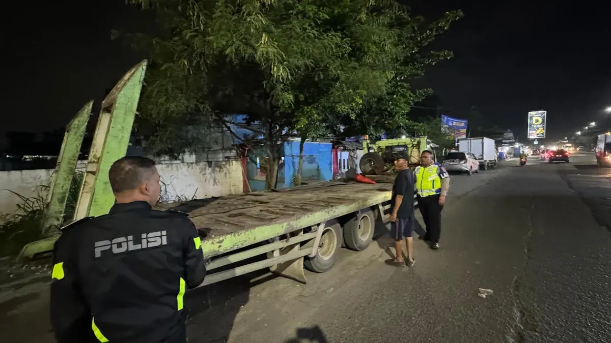 Unit Lakalantas Polresta Tangerang saat melakukan olah TKP. (Sumber: Satlantas Polresta Bandara)