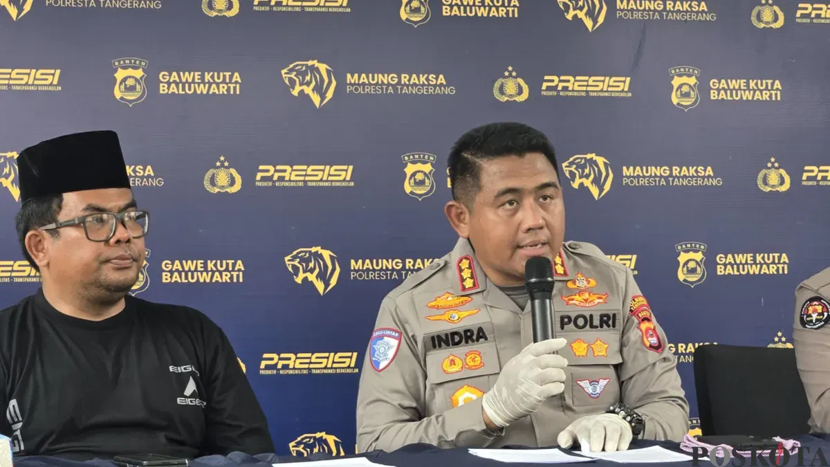 Kapolresta Tangerang, Kombes Pol Andi Muhammad Indra Waspada didampingi Kanit PPA, Iptu Ganda Sihombing saat memberikan statmen kepada awak media. (Sumber: Poskota/Veronica)