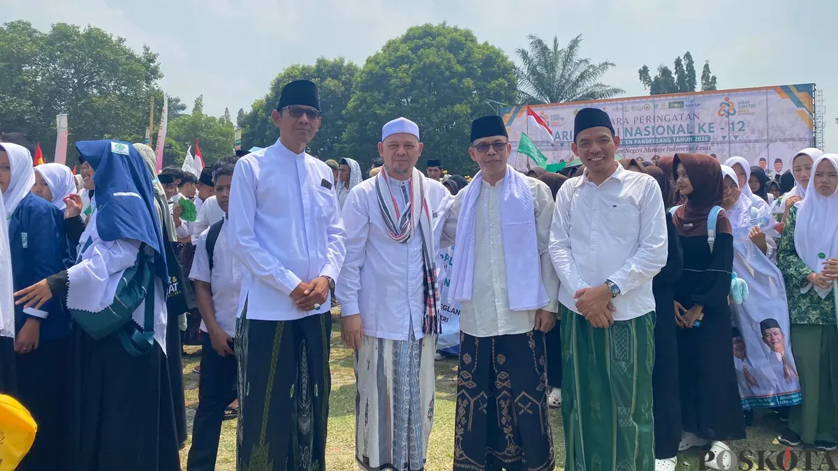 Ketua dan Sekretaris DPC PPP Pandeglang usai mengikuti perayaan Hari Santri Nasional di Alun-alun Pandeglang, Banten, Kamis, 22 Oktober 2026. (Sumber: Poskota/Samsul Fatoni)