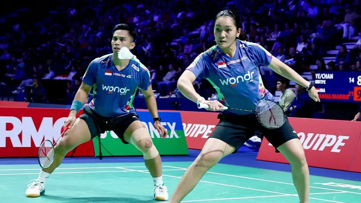 Pasangan pebulutangkis Amri Syahnawi/Nita Violina Marwah lolos ke perempat final Hylo Open 2026 usai menang dalam laga Derbi Indonesia. (Sumber: Instagram/@badminton.ina)