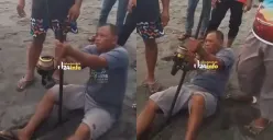Momen seorang pemancing berupaya menyelamatkan wisatawan yang terseret ombak di Pantai Ketawang. (Sumber: Tangkap Layar Instagram/@jabodetabek24info)