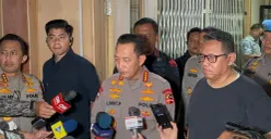 Kapolri Jenderal Polisi Listyo Sigit (tengah). (Sumber: Poskota/Ali Mansur)