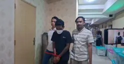 Petugas PPA Polres Metro Depok mengamankan pelaku penganiayaan balita di Tajurhalang, Bogor. (Sumber: Dok Humas Polres Metro Depok)