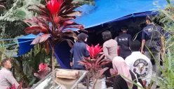 Suasana ekshumasi makam  di TPU Mbah Cikur, Kelurahan Cibabat, Kecamatan Cimahi Utara, Kota Cimahi, Selasa, 14 Januari 2025. (Sumber: Poskota/Gatot Poedji Utomo)