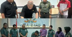 Prosesi penandatanganan kerja sama DITAJENAD dan JNE untuk periode 2025. (Sumber: Dok. JNE)