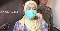 Siti Arini, 42 tahun, wanita asal Sukabumi menangis tersedu-sedu usai gagal berangkat ke Arab Saudi sebagai PMI ilegal. Siti berharap suatu saat nanti bisa berangkat sebagai pekerja resmi. Jumat 4 Juli 2025. (Sumber: Poskota/Nurpini Aulia Rapika)