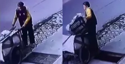 Aksi pencurian besi penutup saluran air oleh seorang pemulung di Banjarmasin, Kalimantan Selatan. (Sumber: Tangkap Layar Instagram/@funnelmedia)