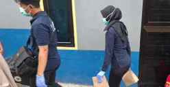Polisi lakukan olah TKP tempat kontrakan pelaku mutilasi di Depok. (Sumber: Poskota/Angga)