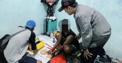 Pelaku saat diamanakan oleh petugas kepolisian. (Sumber: Istimewa)