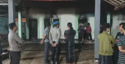 Petugas Damkar Kota Depok dan Polsek Cimanggis melakukan pengamanan di lokasi kebakaran Ponpes di Tapos. (Sumber: Polsek Cimanggis)