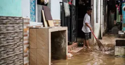 Ilustrasi pemukiman warga tergenang banjir. (Sumber: Poskota/Bilal Nugraha Ginanjar)
